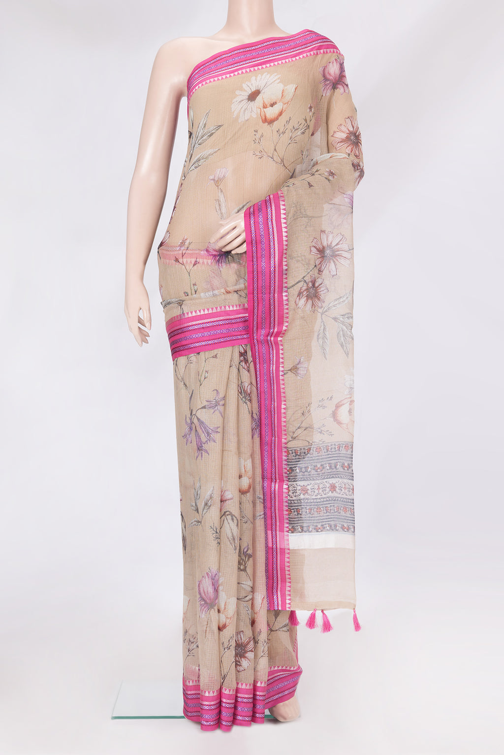 Beige Kota Silk Saree with Printed design on the body and Thread Border.  displayed on a mannequin