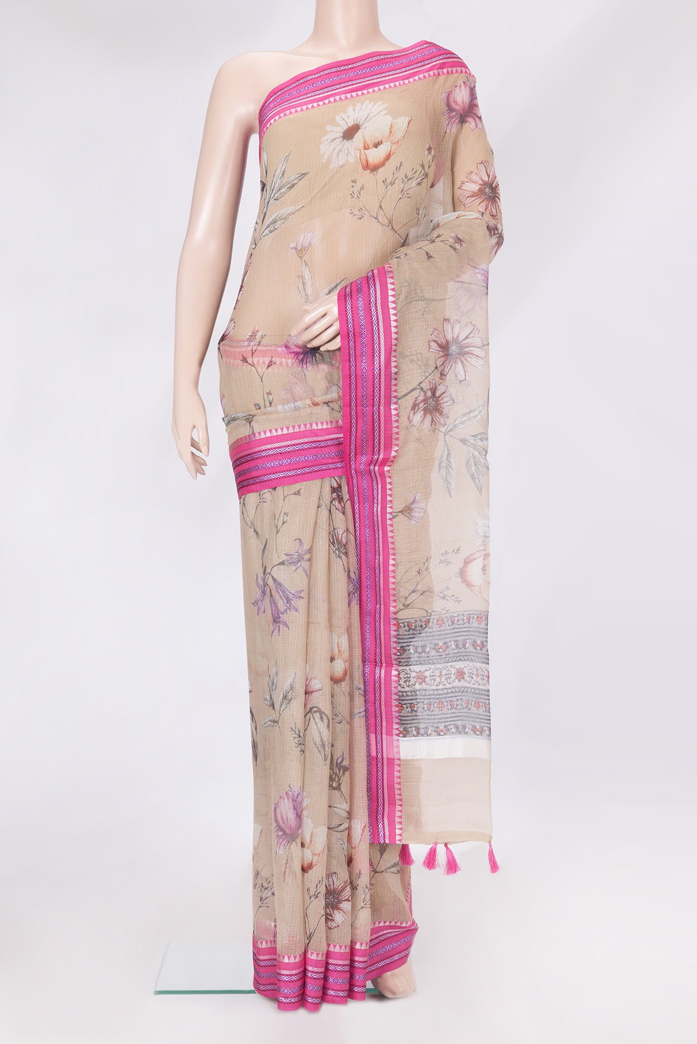 Beige Kota Silk Saree with Printed design on the body and Thread Border.  displayed on a mannequin