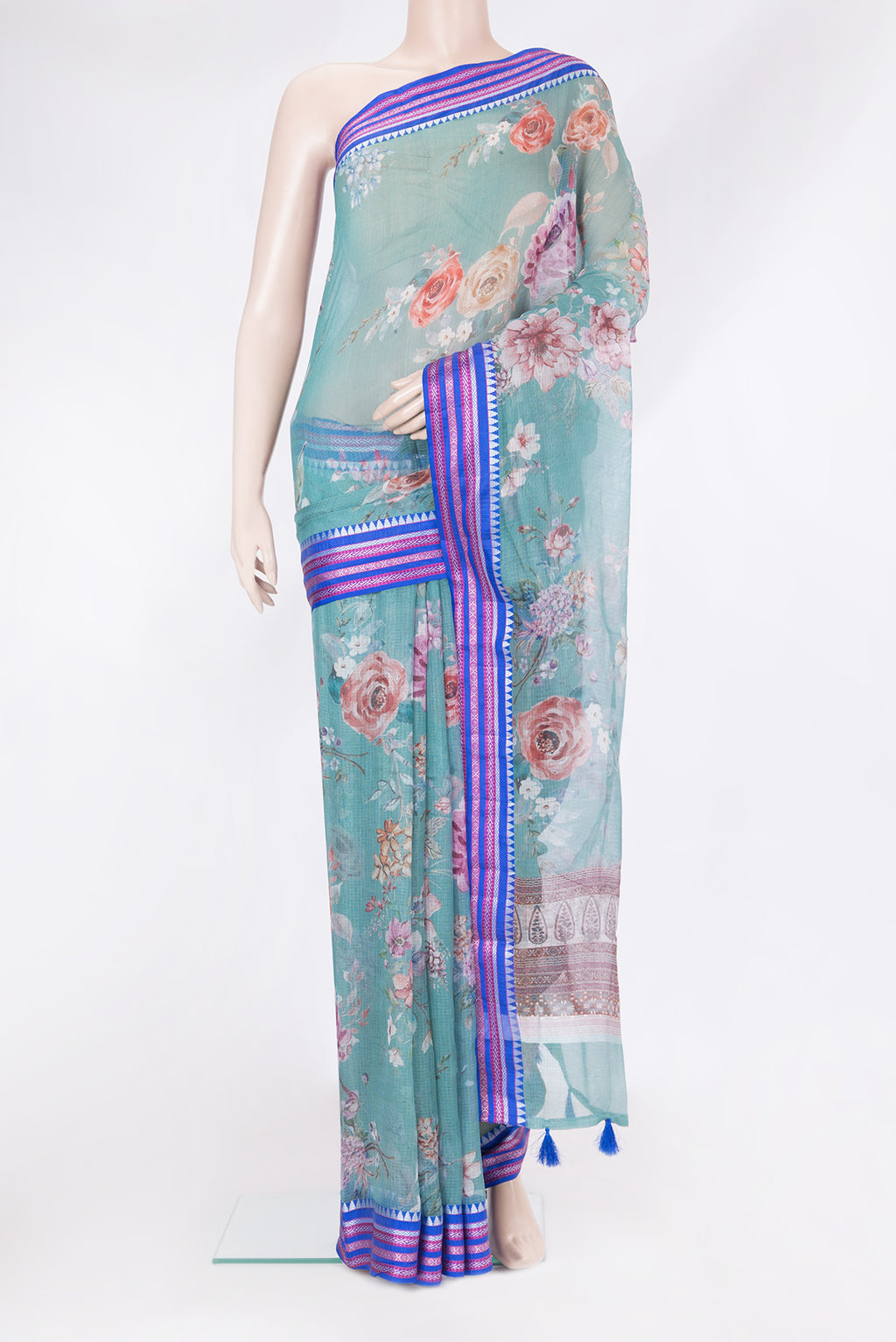 Sea Green Kota Silk Saree with Printed design on the body and Thread Border.  displayed on a mannequin