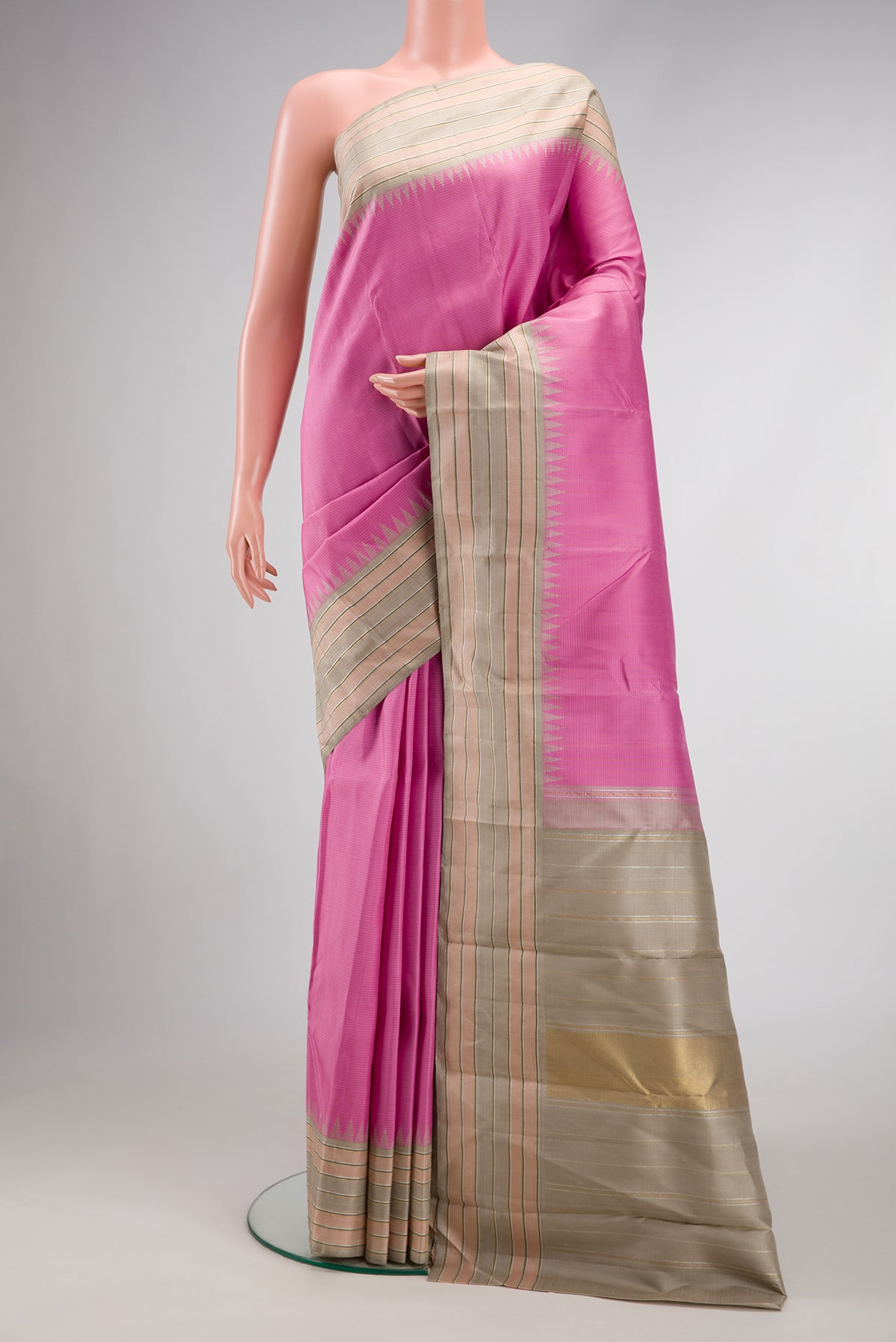 Pure Silk Pure Zari Pink Dual Tone Kanjivaram Saree with Stripes on the body and Zari Border.  displayed on a mannequin