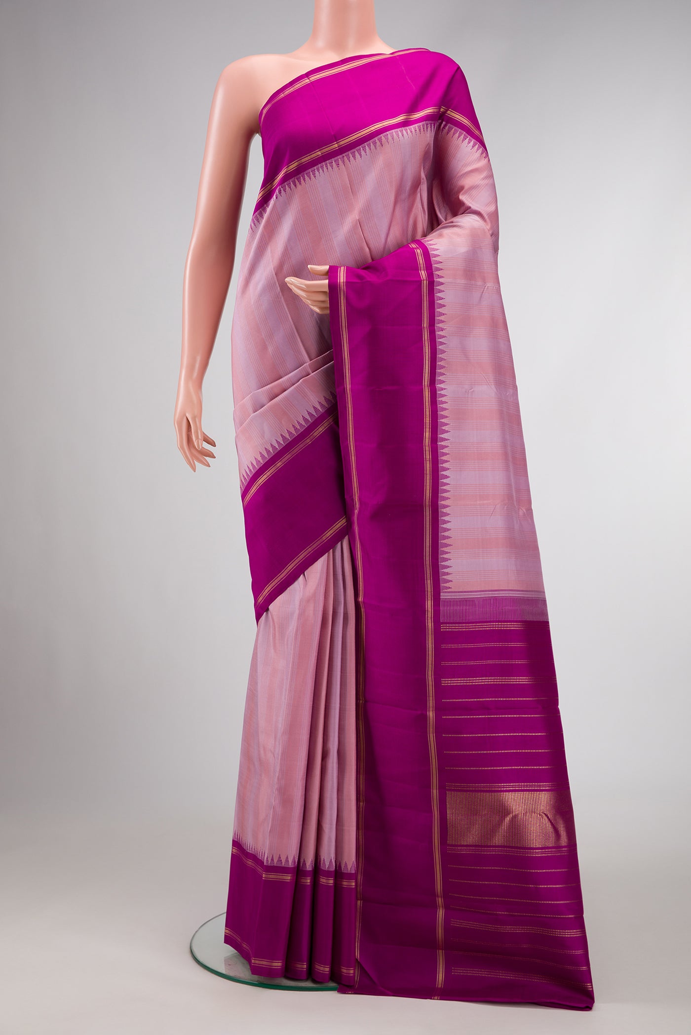 Pure Silk Pure Zari Lavender Dual Tone Kanjivaram Saree with Stripes on the body and Zari Border.  displayed on a mannequin