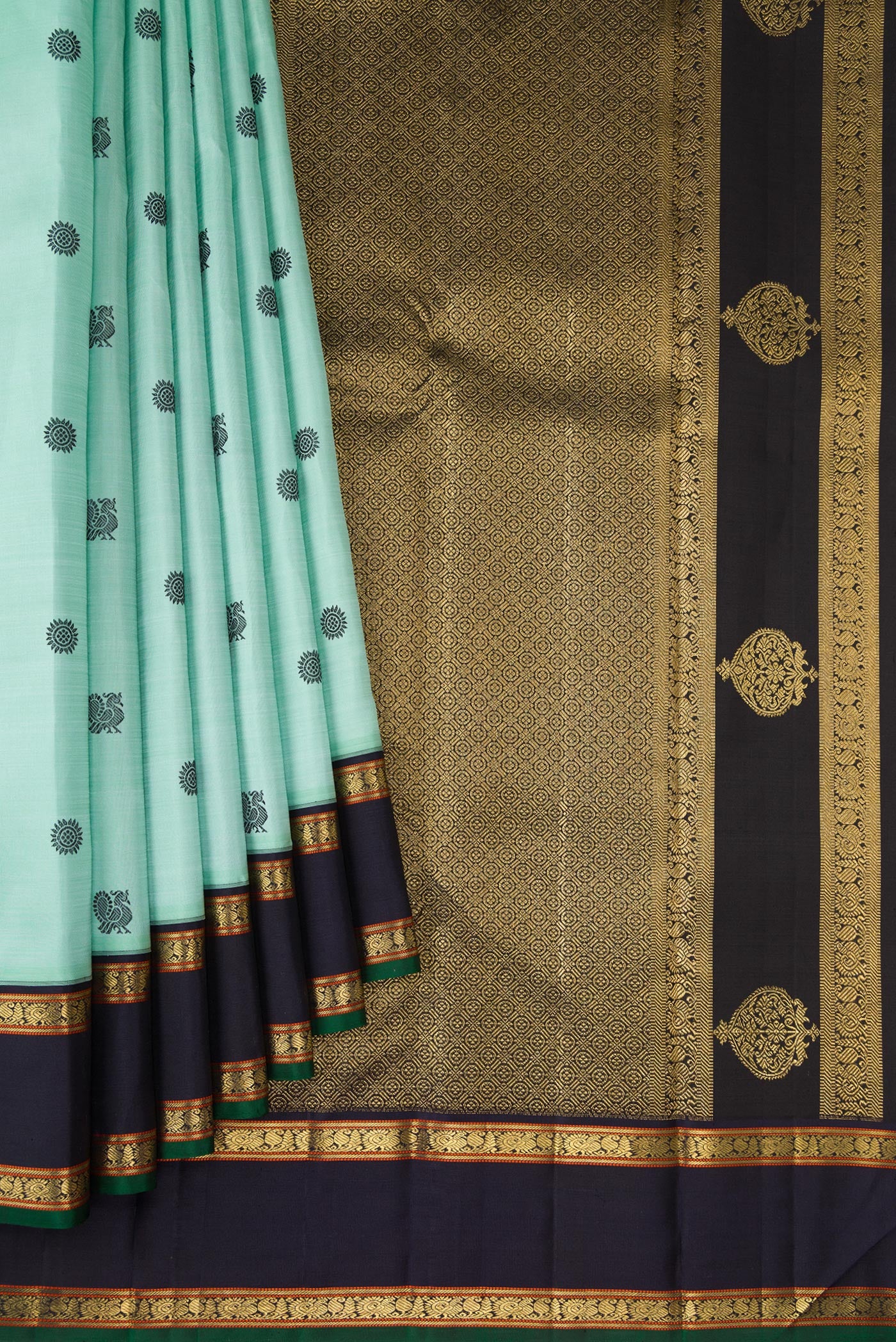 Pleats and pallu of Pure Silk Pure Zari Light Blue Dual Tone Kanchipuram Saree with Thread Butta on the body and Zari Border. 