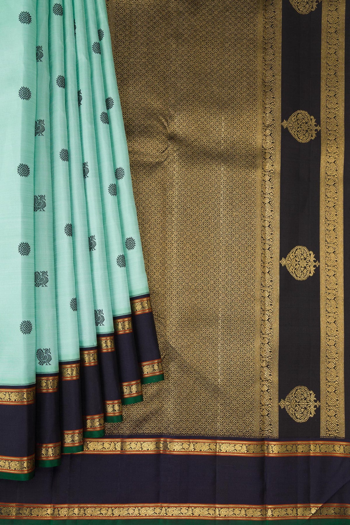 Pleats and pallu of Pure Silk Pure Zari Light Blue Dual Tone Kanchipuram Saree with Thread Butta on the body and Zari Border. 