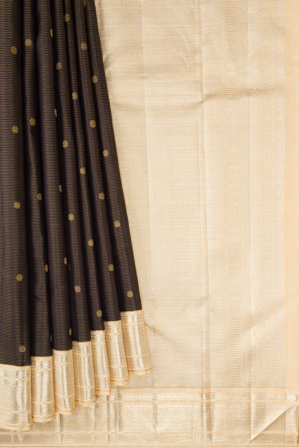 Pleats and pallu of Black Dual Tone Kanchipuram Silk Saree with Stripes on the body and Zari Border. 
