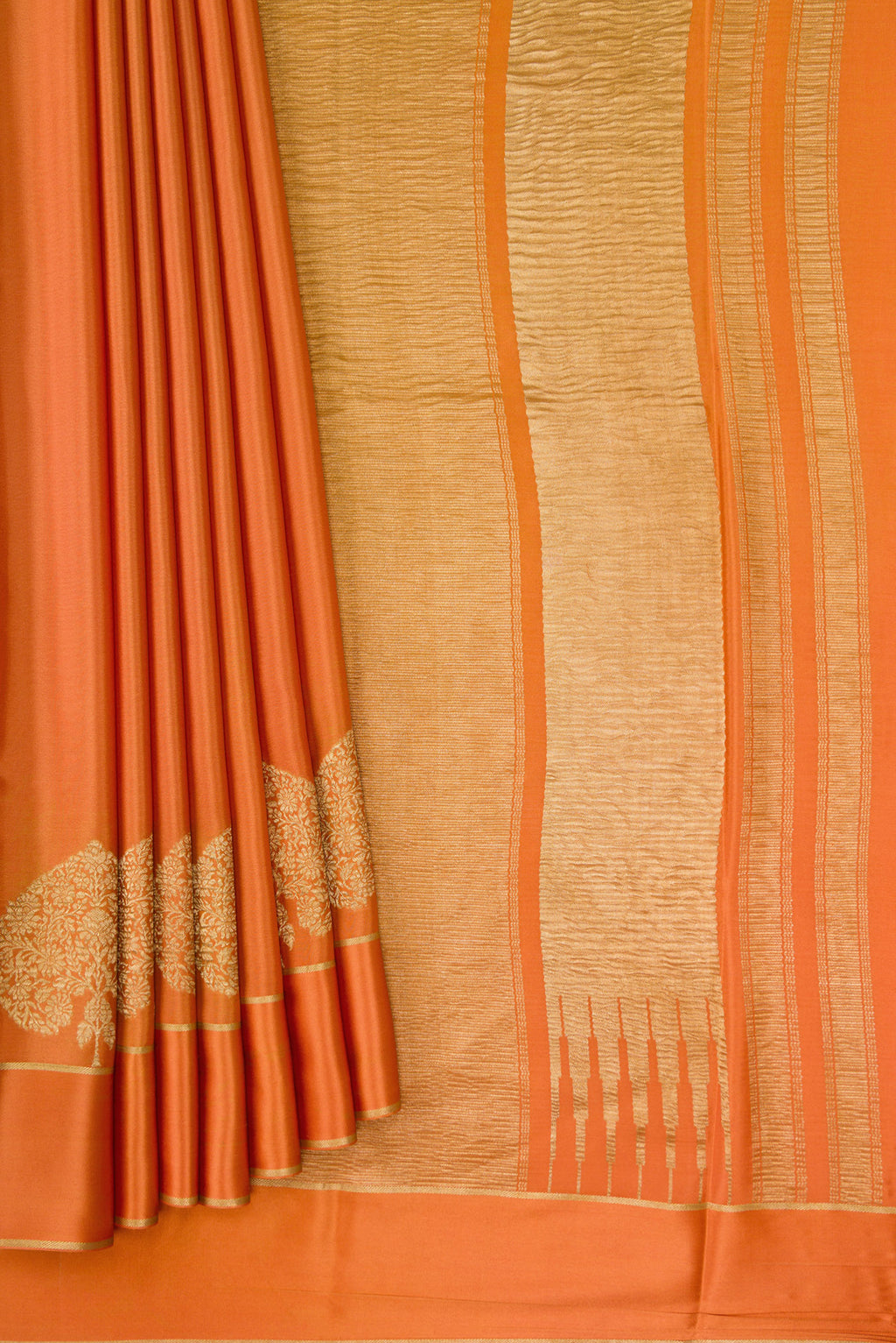 Pleats and pallu of Orange Dual Tone Crepe Saree with Plain Body and Fancy Border. 
