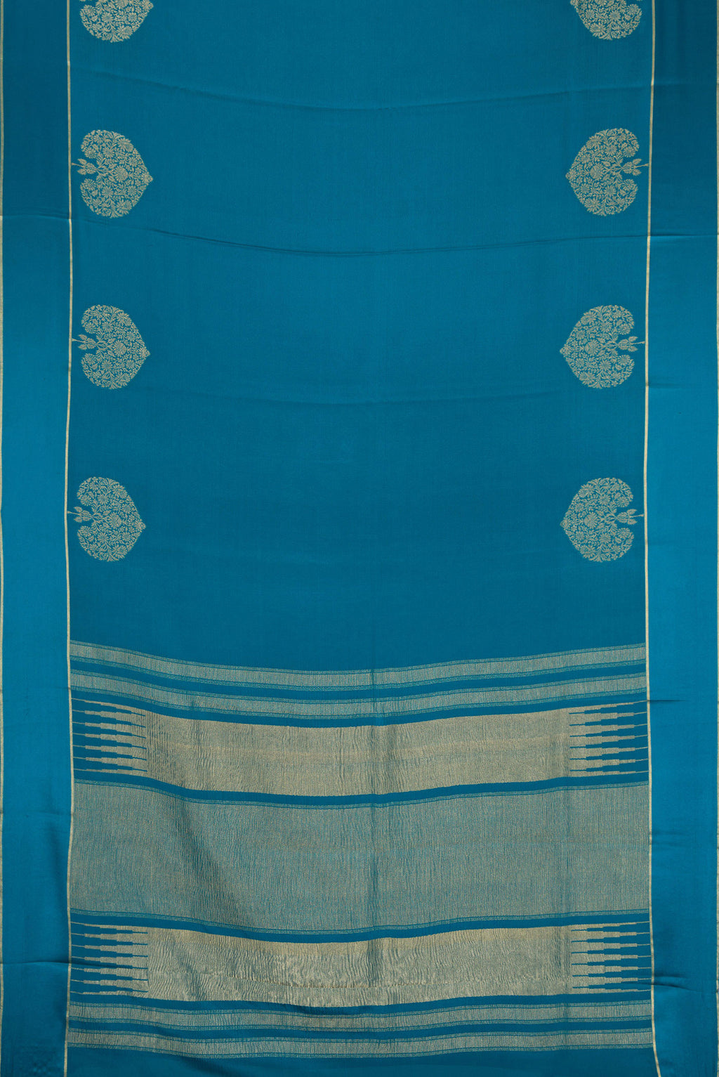 Flat view of Peacock Blue Dual Tone Mysore Crepe Saree with Plain Body and Fancy Border. 