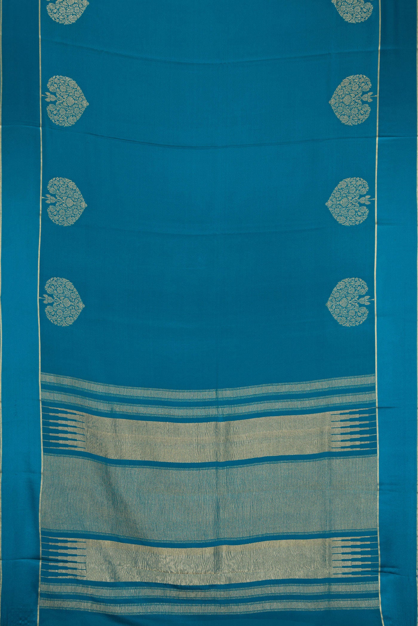 Flat view of Peacock Blue Dual Tone Mysore Crepe Saree with Plain Body and Fancy Border. 