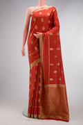 Orange Dual Tone Georgette Saree with Zari Butta on the body and Zari Border.  displayed on a mannequin