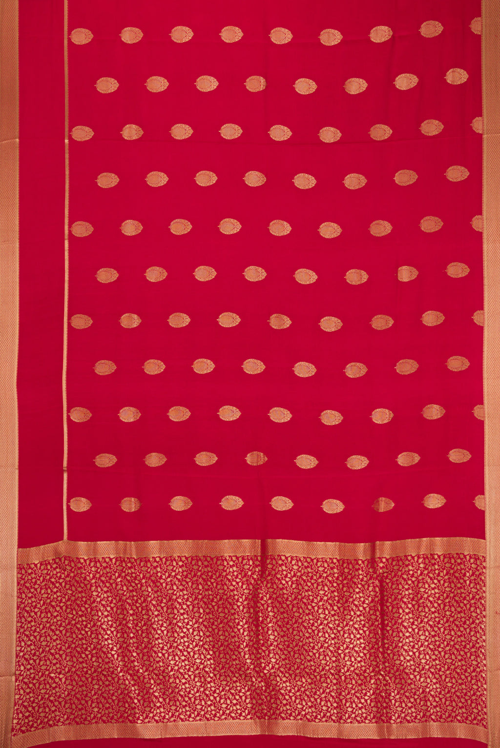 Flat view of Red Mysore Crepe Saree with Zari Butta on the body and Zari Border. 