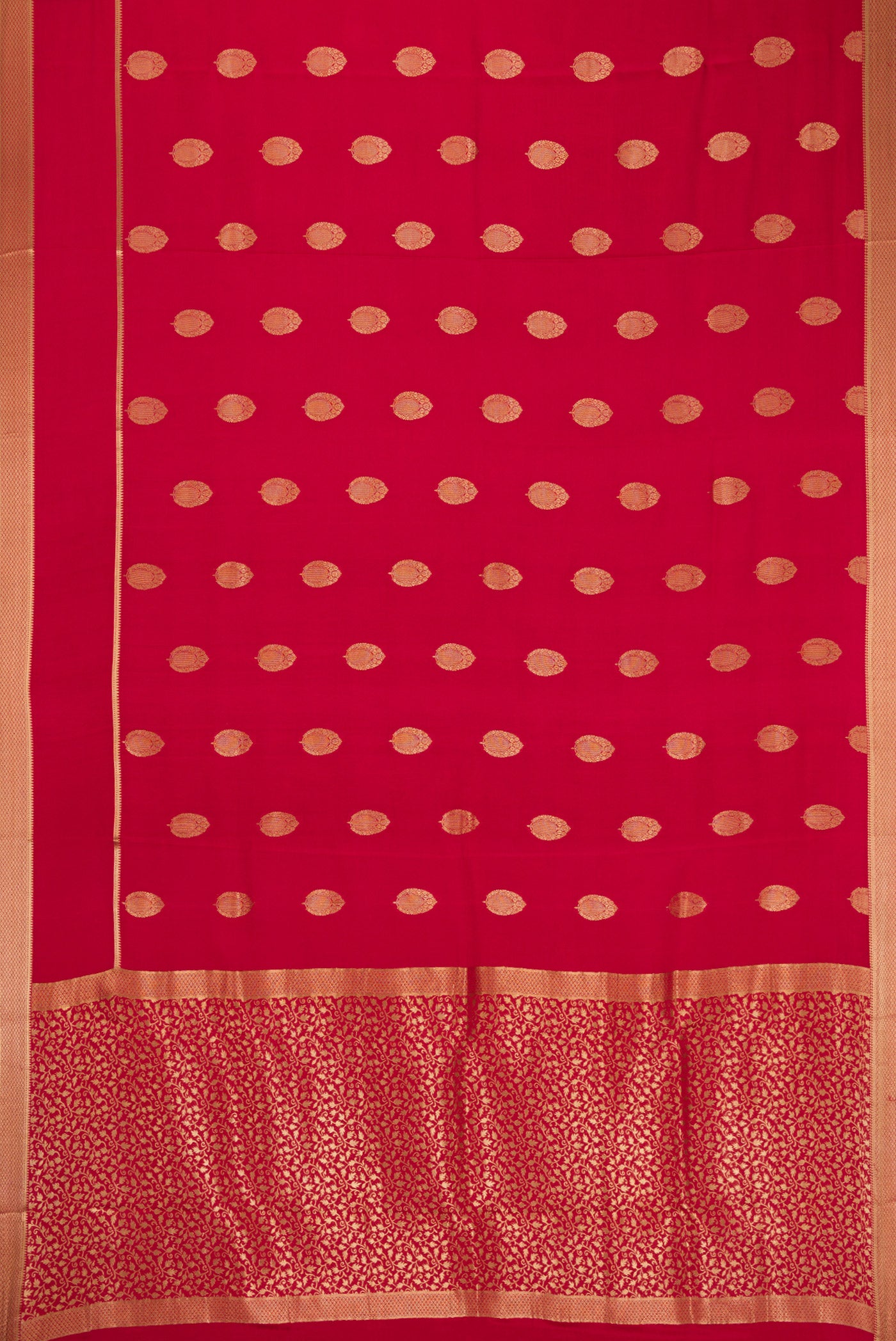 Flat view of Red Mysore Crepe Saree with Zari Butta on the body and Zari Border. 