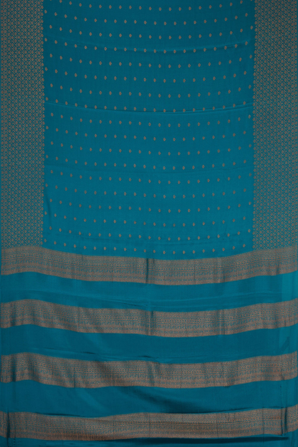 Flat view of Peacock Blue Dual Tone Mysore Crepe Saree with Zari Butta on the body and Fancy Border. 