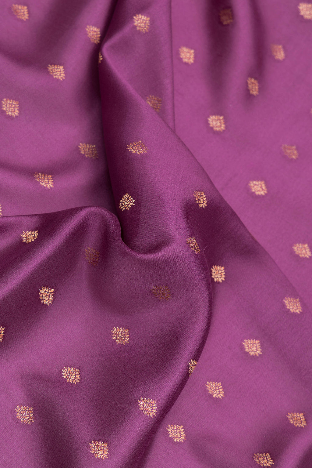 Close up of Purple Dual Tone Mysore Crepe Saree with Zari Butta on the body and Zari Border.  displaying folds