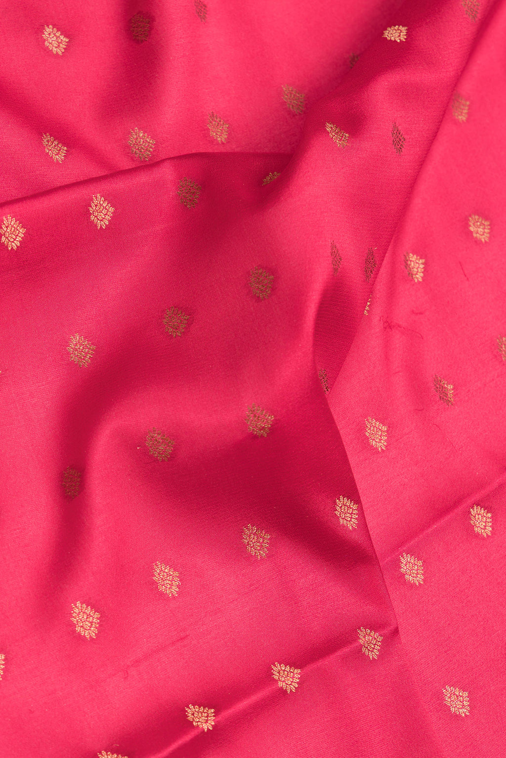 Close up of Dark Pink Dual Tone Mysore Silk Saree with Zari Butta on the body and Zari Border.  displaying folds