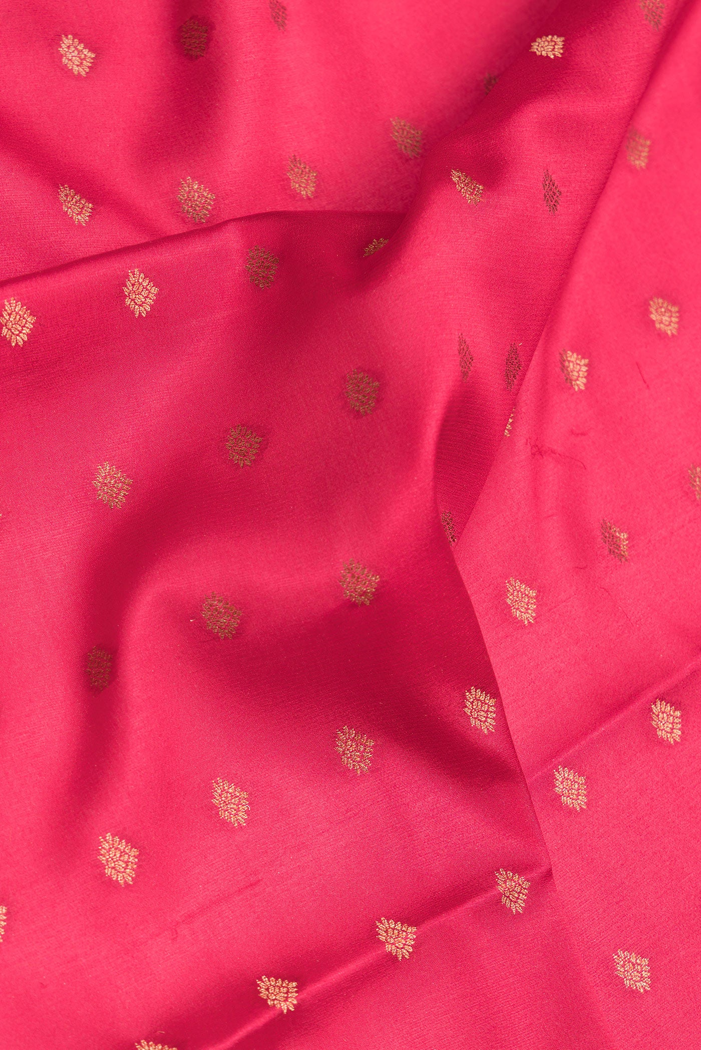 Close up of Dark Pink Dual Tone Mysore Silk Saree with Zari Butta on the body and Zari Border.  displaying folds