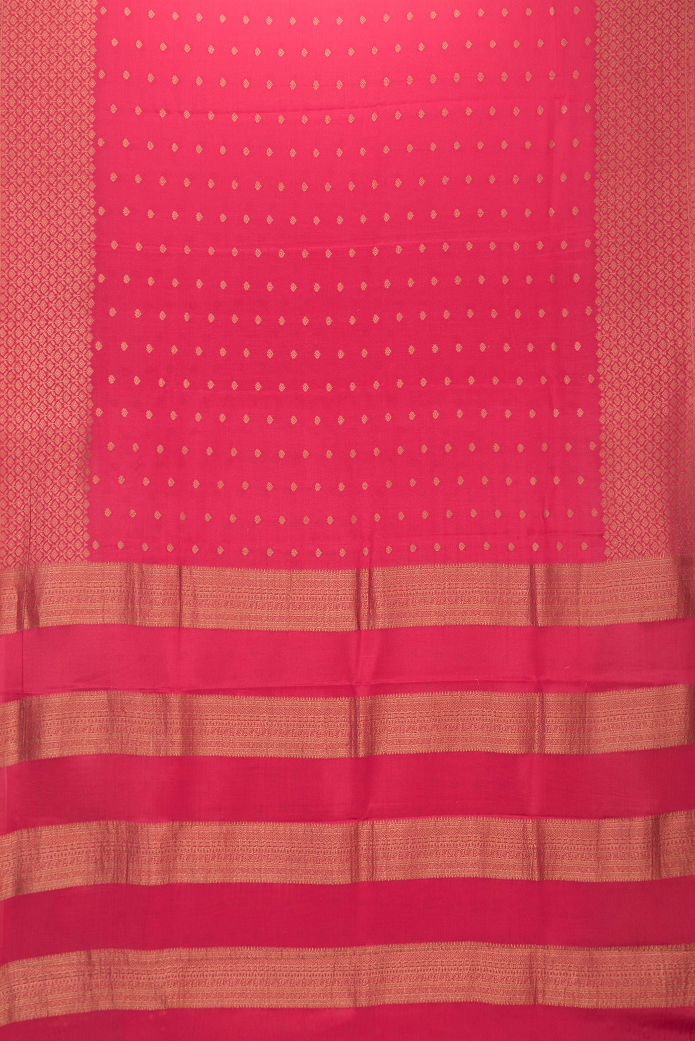 Flat view of Dark Pink Dual Tone Mysore Silk Saree with Zari Butta on the body and Zari Border. 