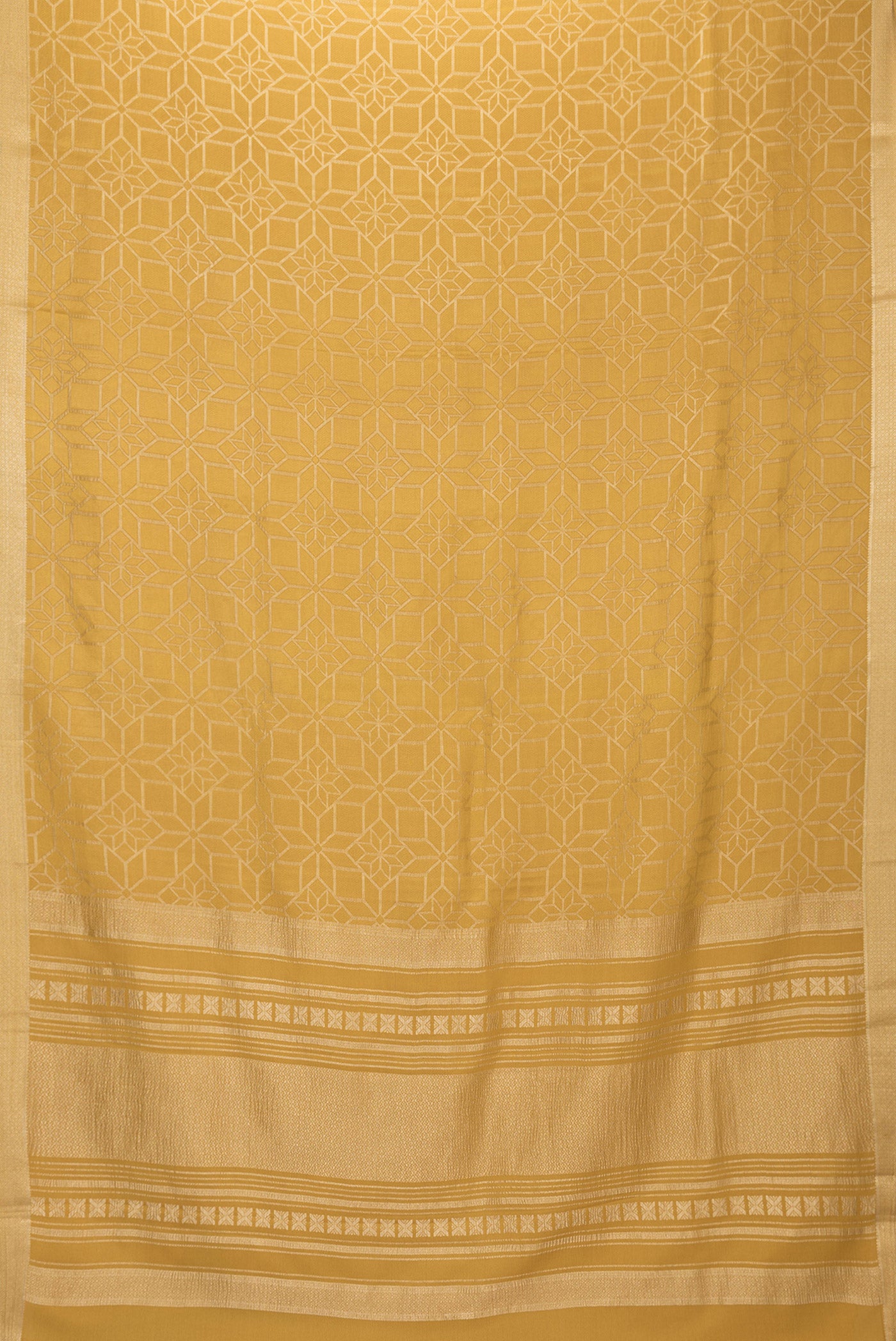Flat view of Gold Dual Tone Mysore Crepe Saree with Zari Brocade on the body and Zari Border. 