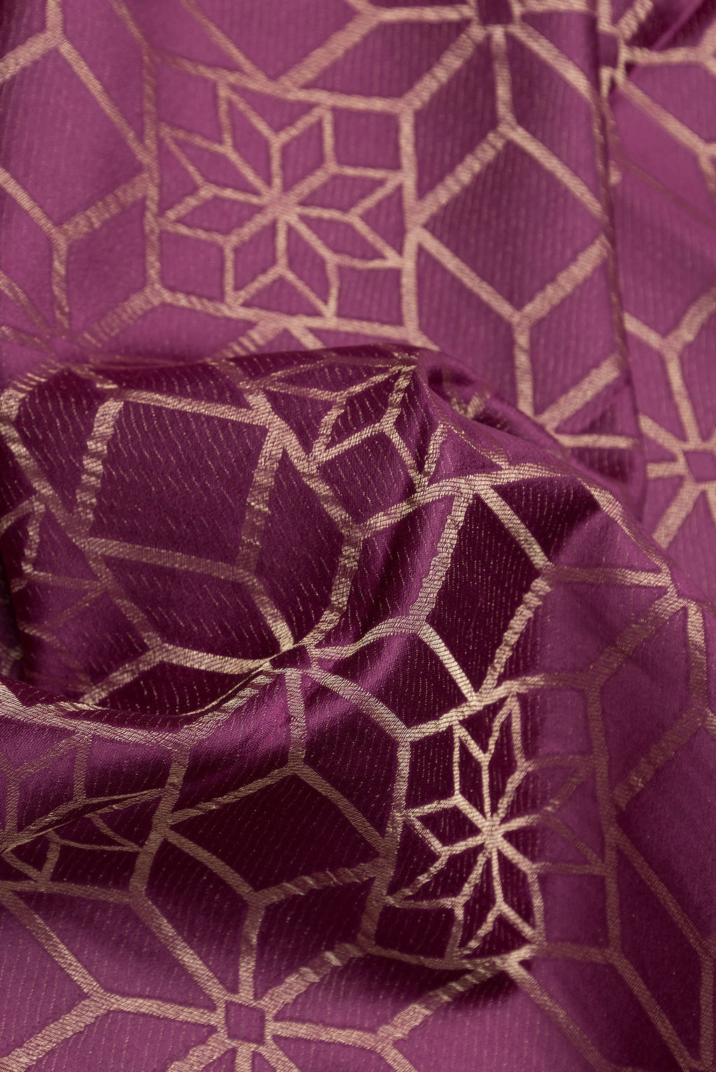 Close up of Purple Dual Tone Mysore Crepe Saree with Zari Brocade on the body and Zari Border.  displaying folds