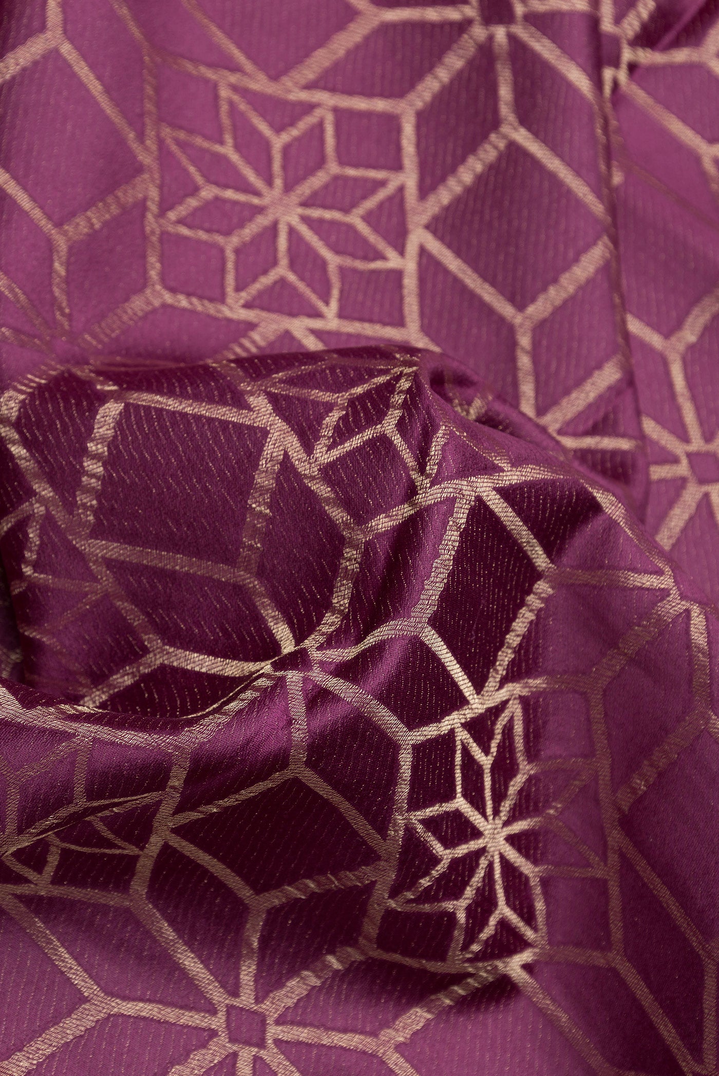 Close up of Purple Dual Tone Mysore Crepe Saree with Zari Brocade on the body and Zari Border.  displaying folds
