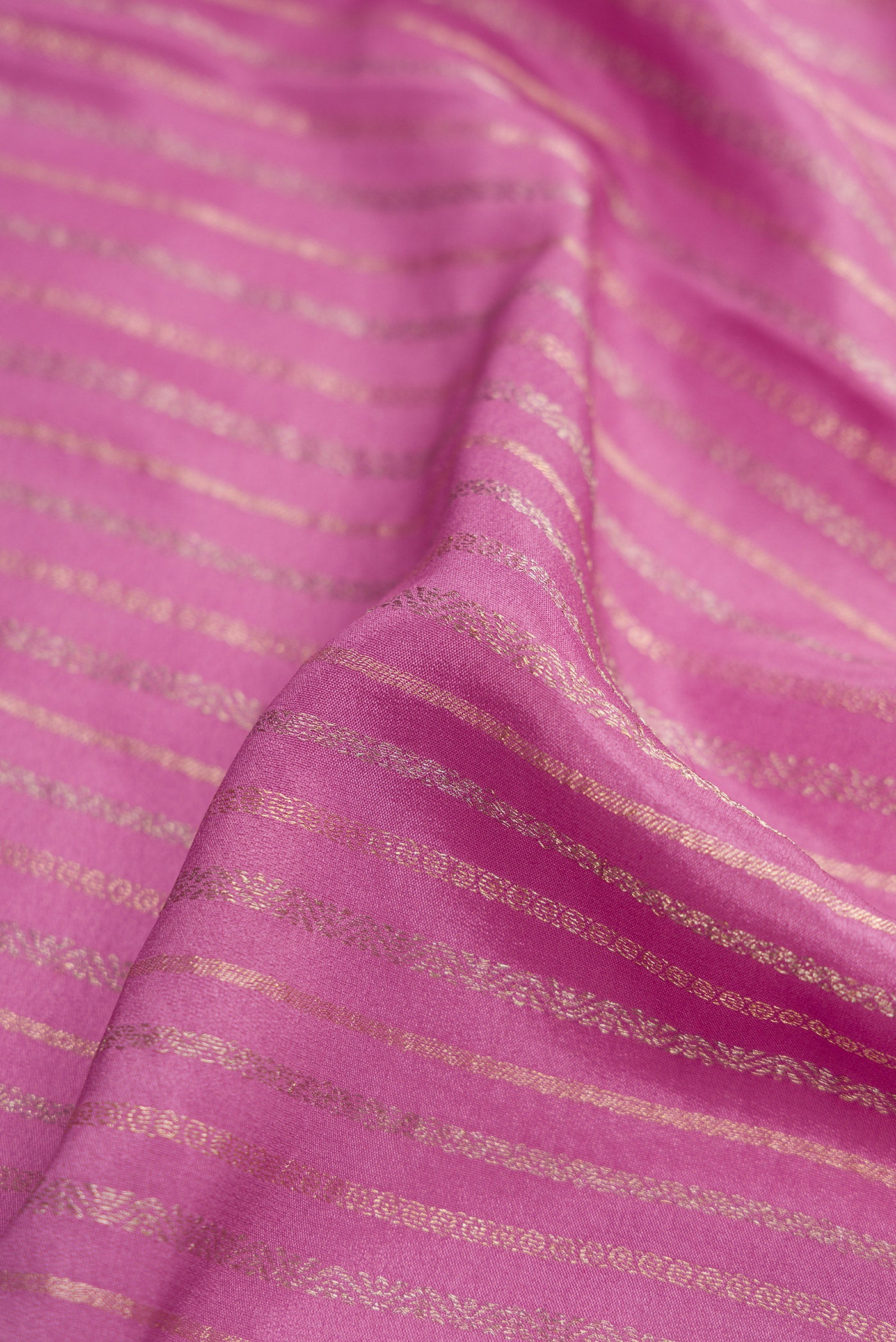 Close up of Lavender Dual Tone Mysore Crepe Saree with Stripes on the body and Zari Border.  displaying folds