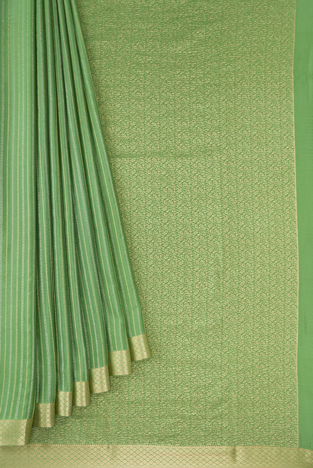 Pleats and pallu of Pista Green Mysore Crepe Saree with Stripes on the body and Zari Border. 
