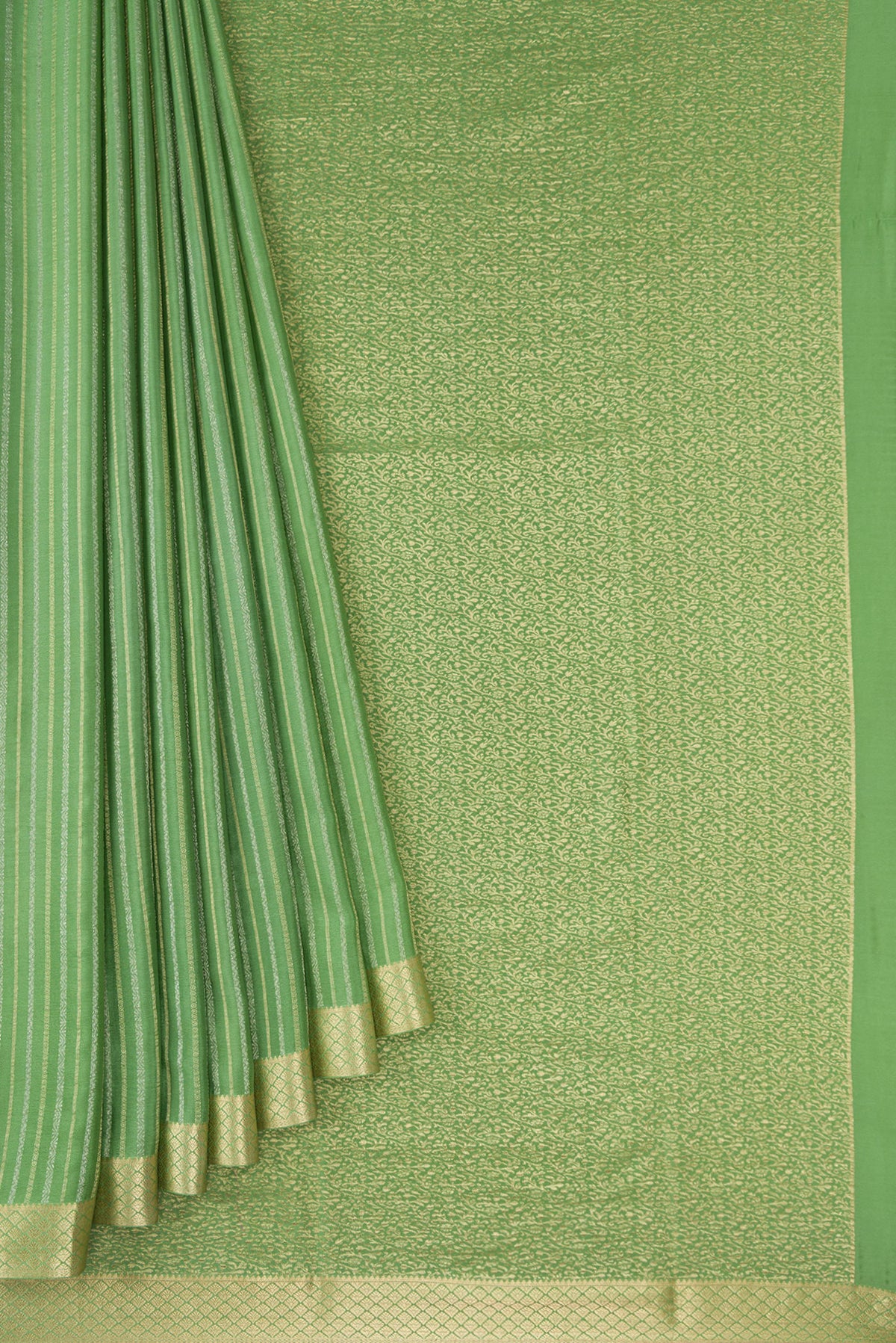 Pleats and pallu of Pista Green Mysore Crepe Saree with Stripes on the body and Zari Border. 