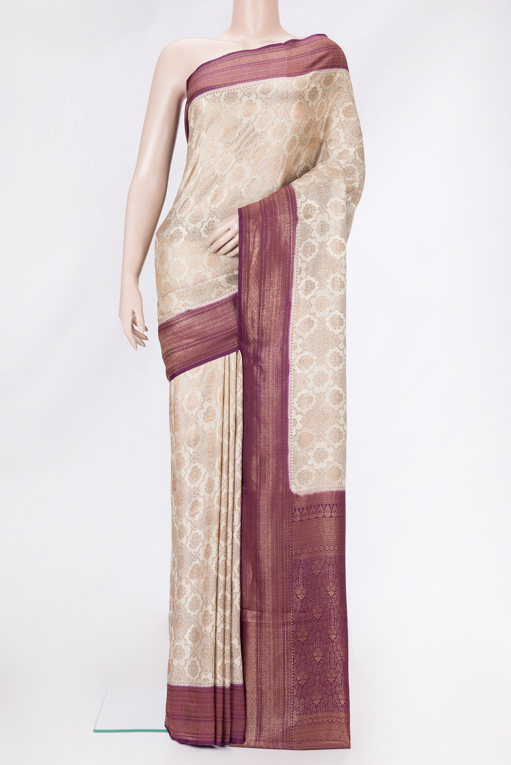 Beige Dual Tone Banarasi Georgette Saree with Zari Brocade on the body and Zari Border.  displayed on a mannequin