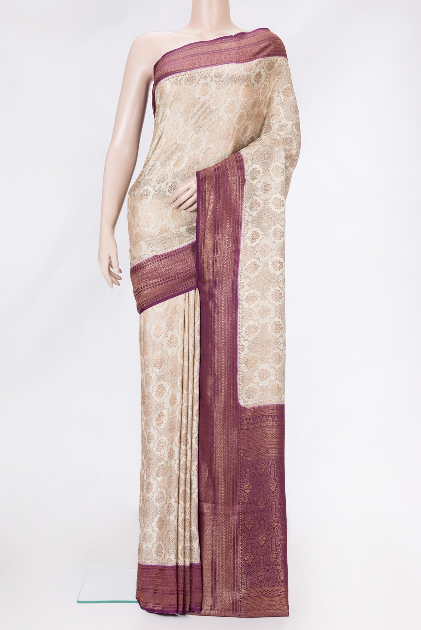 Beige Dual Tone Banarasi Georgette Saree with Zari Brocade on the body and Zari Border.  displayed on a mannequin