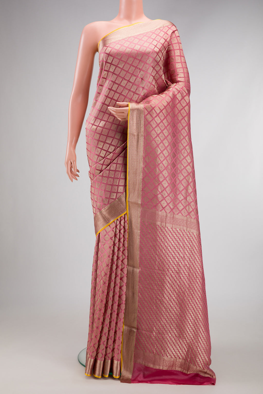 Pink Dual Tone Mysore Crepe Saree with Zari Brocade on the body and Zari Border.  displayed on a mannequin
