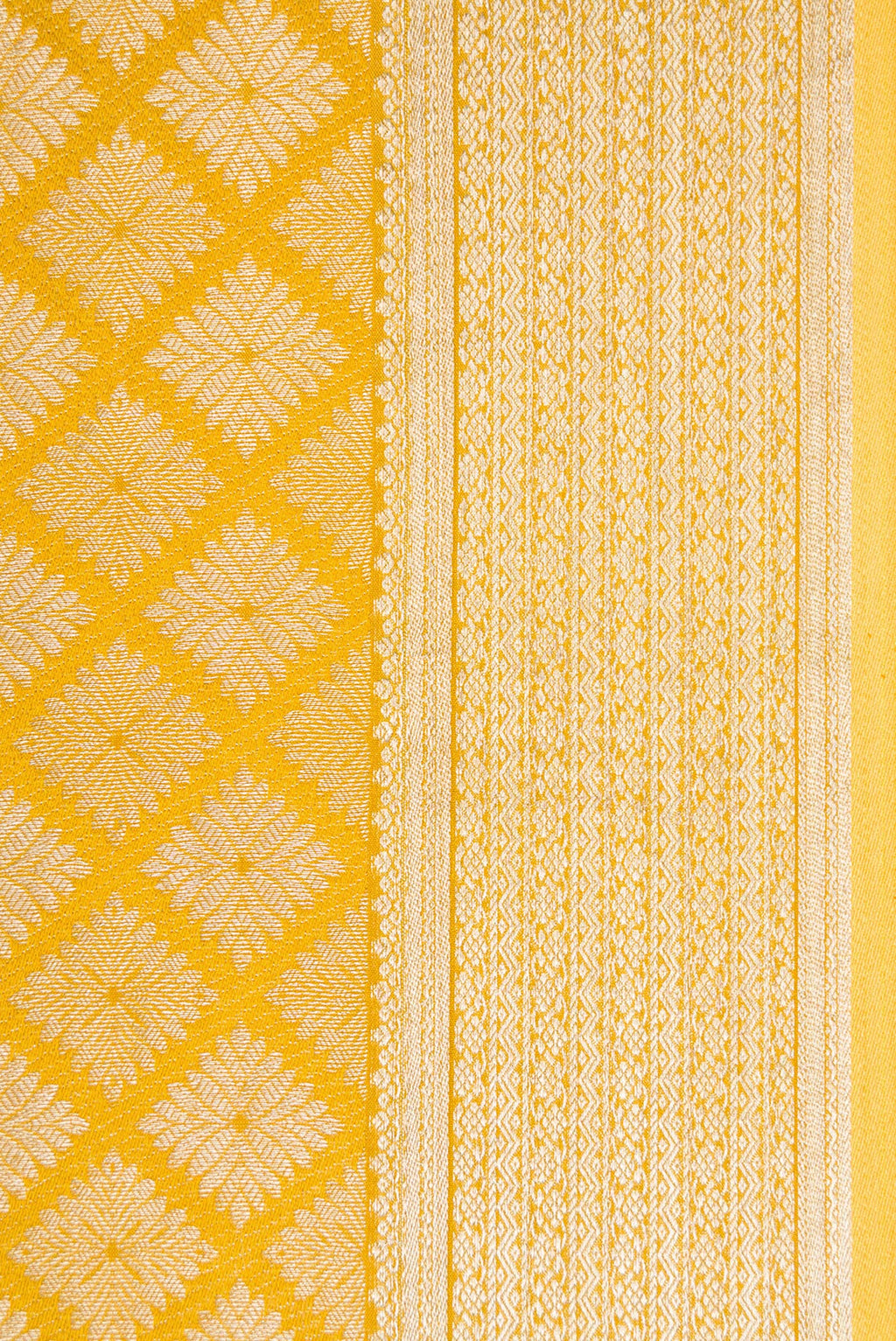 Border image of Mustard Dual Tone Mysore Crepe Saree with Zari Brocade on the body and Zari Border. 