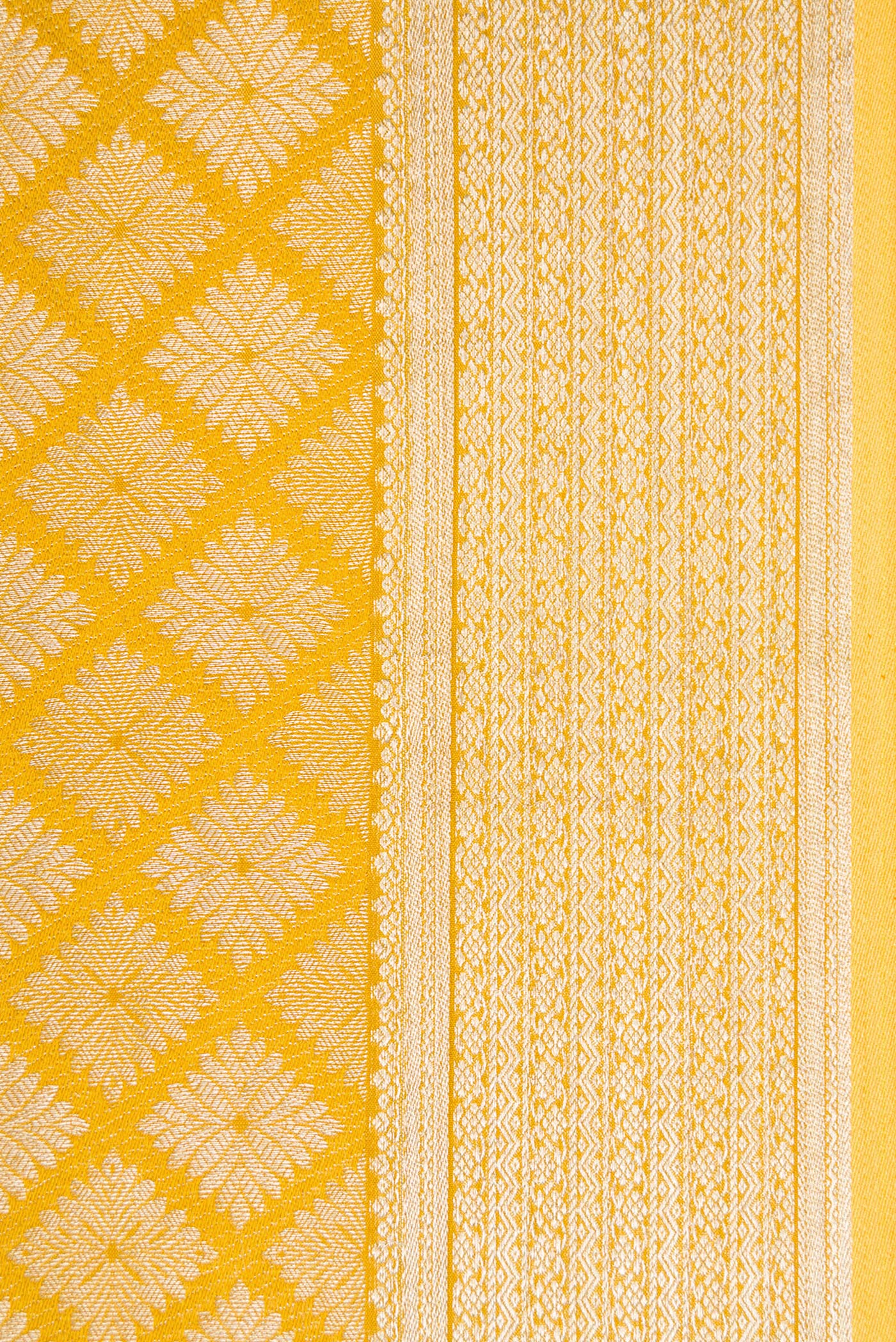 Border image of Mustard Dual Tone Mysore Crepe Saree with Zari Brocade on the body and Zari Border. 