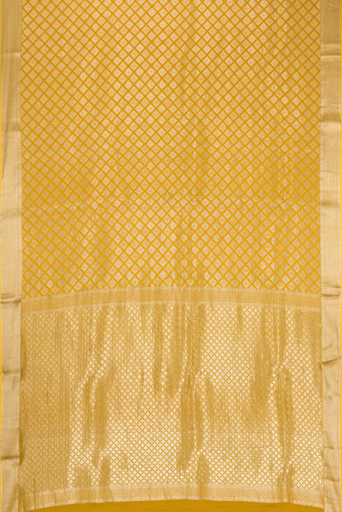 Flat view of Mustard Dual Tone Mysore Crepe Saree with Zari Brocade on the body and Zari Border. 