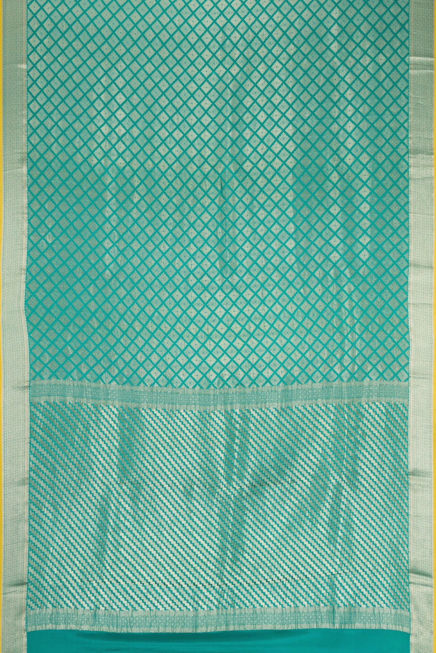 Flat view of Sky Blue Mysore Crepe Saree with Zari Brocade on the body and Zari Border. 