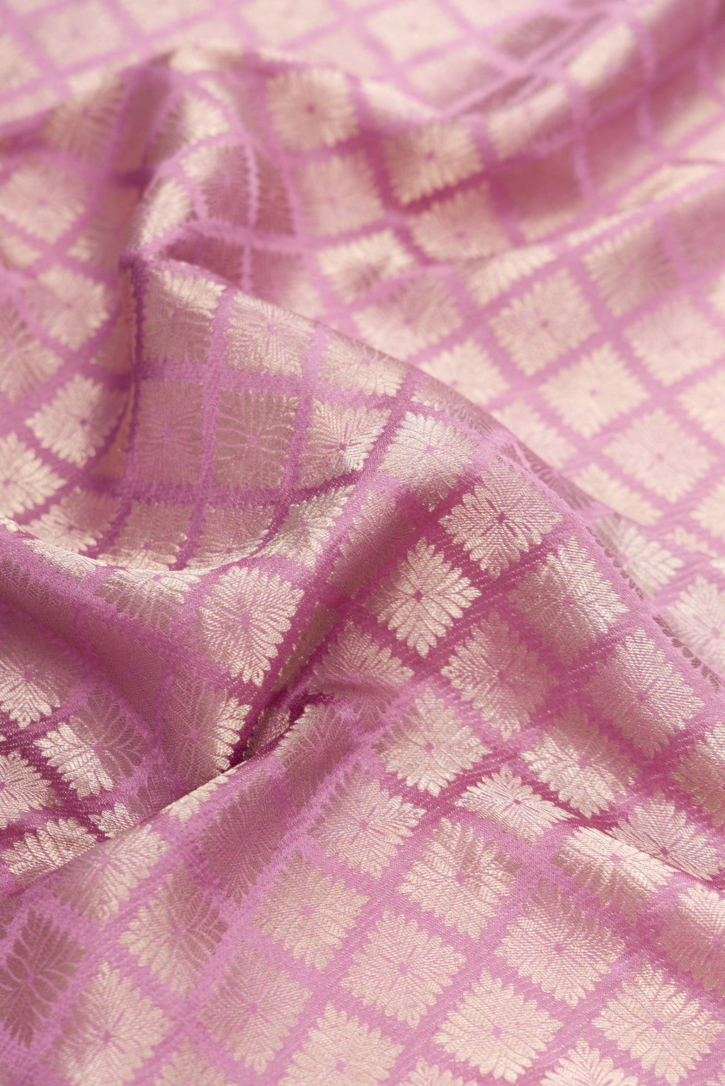Close up of Lavender Dual Tone Mysore Crepe Saree with Zari Brocade on the body and Zari Border.  displaying folds