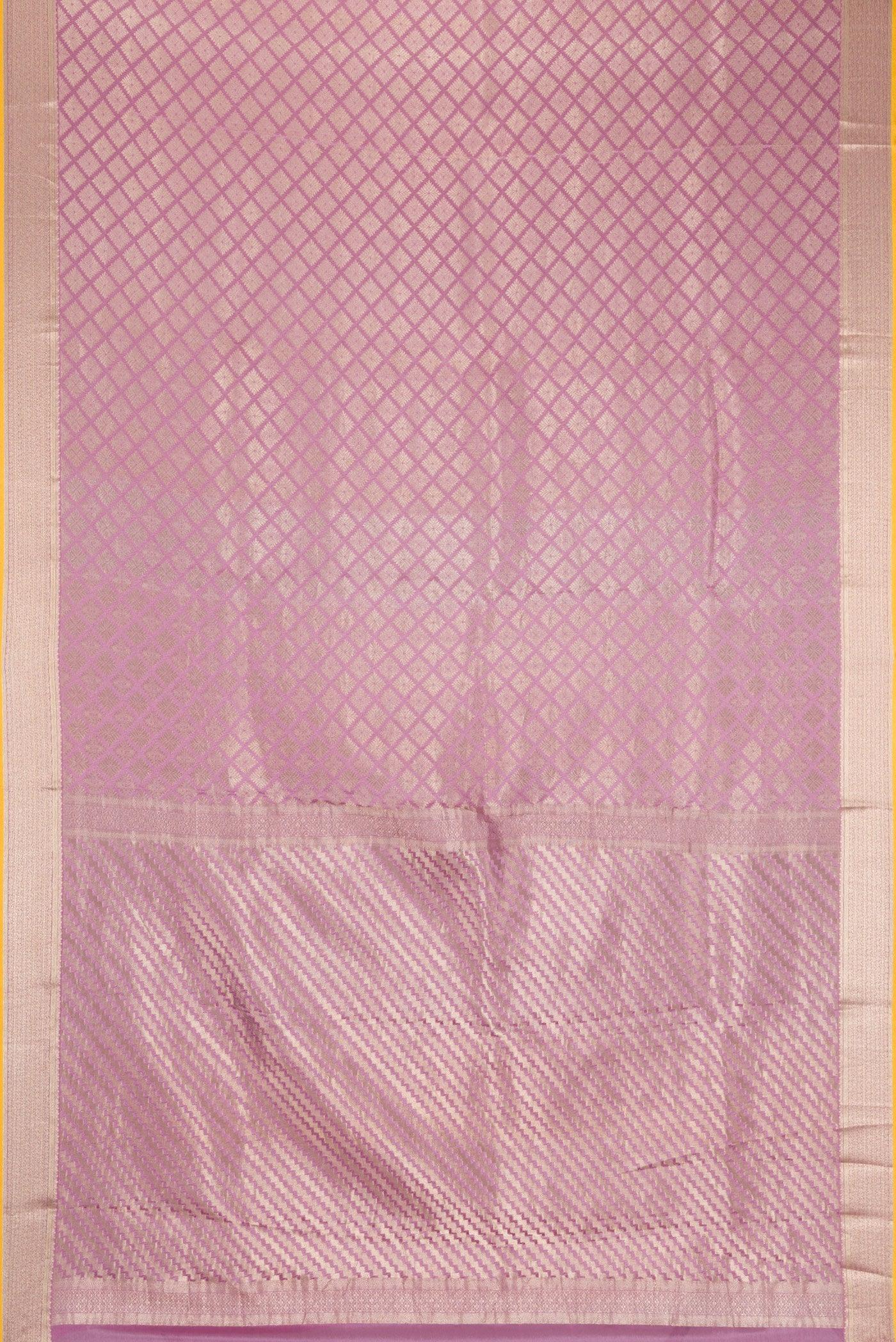 Flat view of Lavender Dual Tone Mysore Crepe Saree with Zari Brocade on the body and Zari Border. 