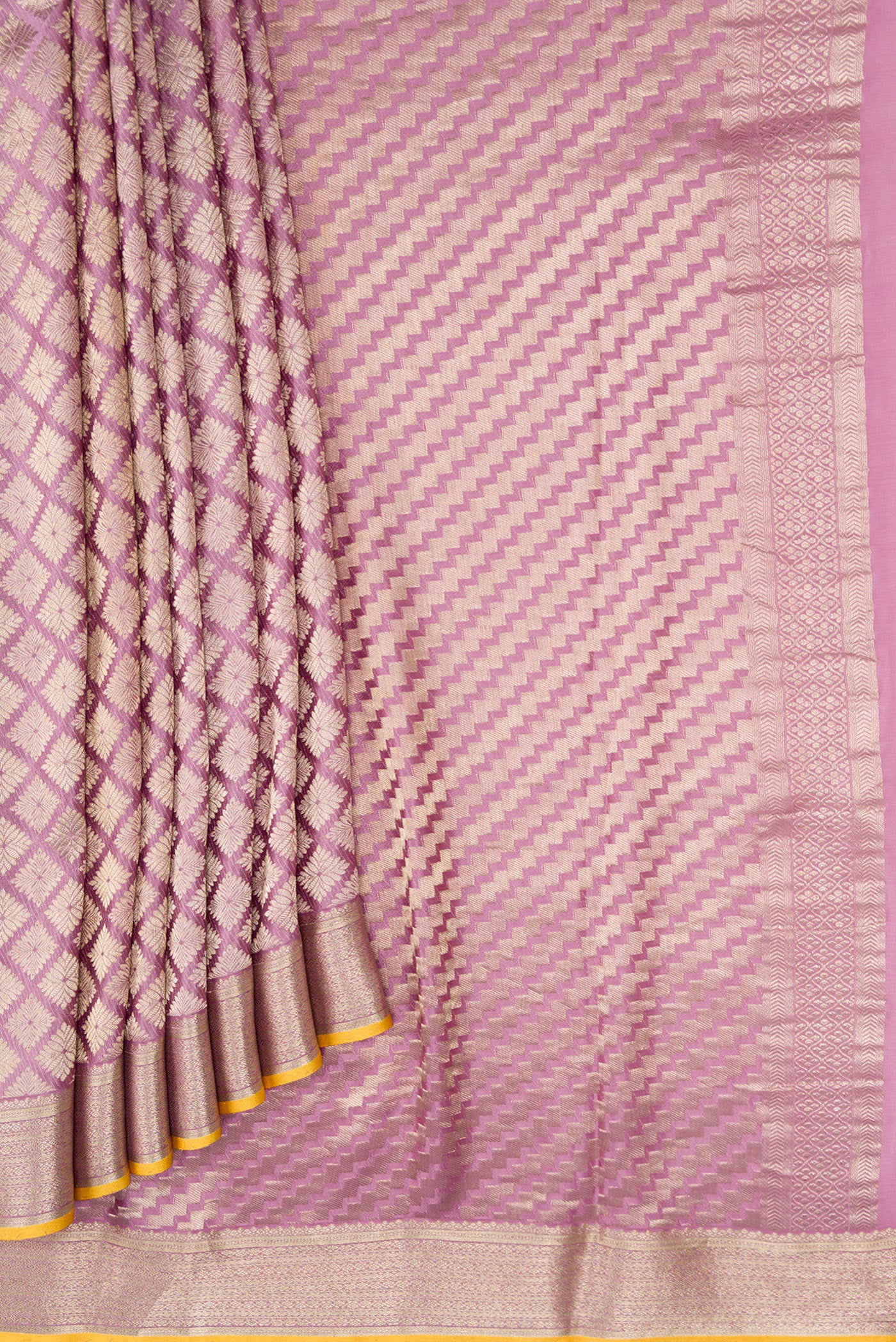 Pleats and pallu of Lavender Dual Tone Mysore Crepe Saree with Zari Brocade on the body and Zari Border. 