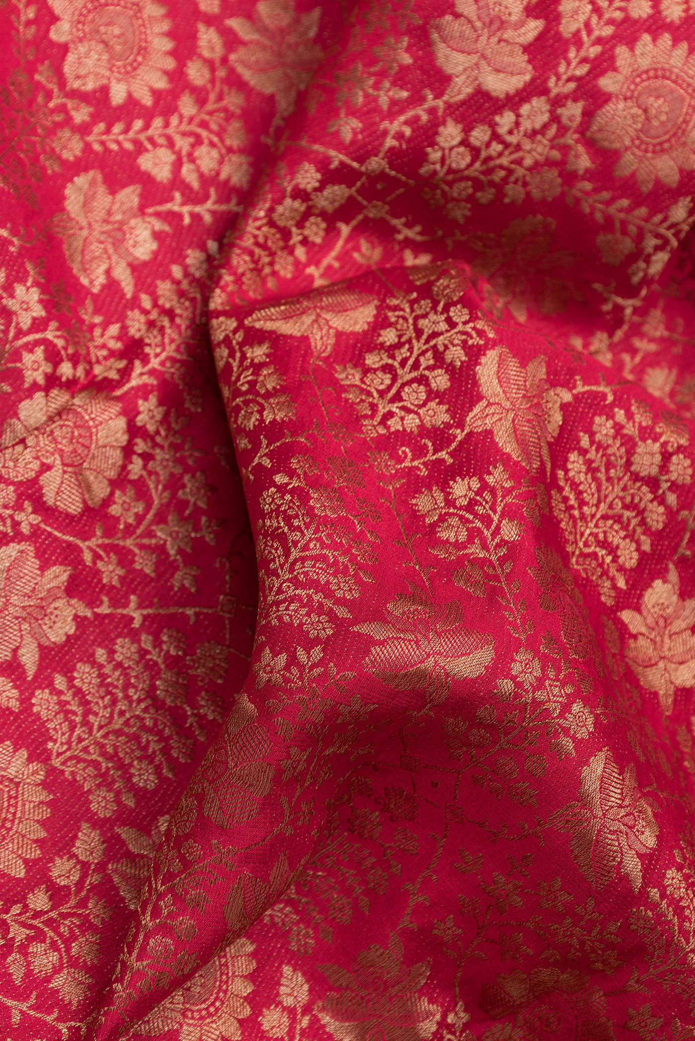 Close up of Pink Dual Tone Mysore Crepe Saree with Zari Brocade on the body and Zari Border.  displaying folds