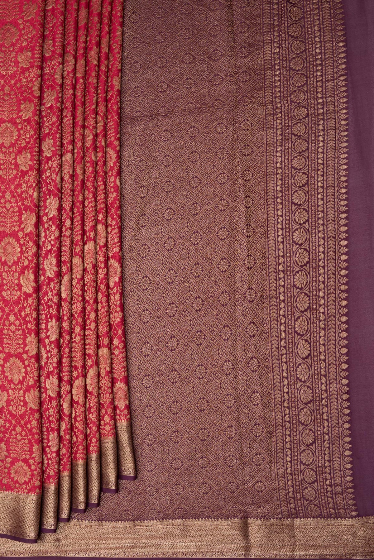 Pleats and pallu of Pink Dual Tone Mysore Crepe Saree with Zari Brocade on the body and Zari Border. 