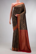 Black Mysore Crepe Saree with Zari Brocade on the body and Zari Border.  displayed on a mannequin