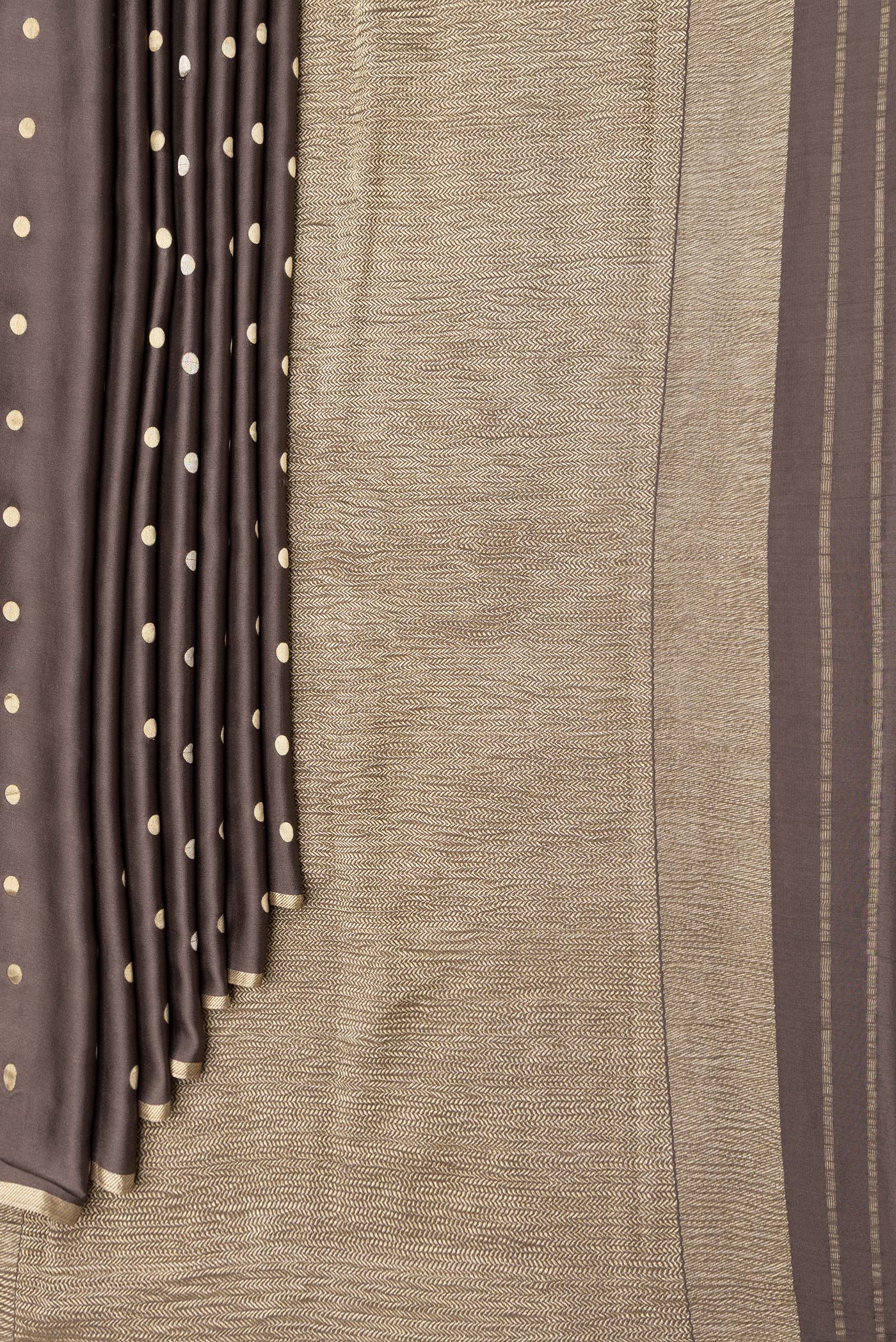 Pleats and pallu of Brown Dual Tone Mysore Silk Saree with Zari Butta on the body and Zari Border. 