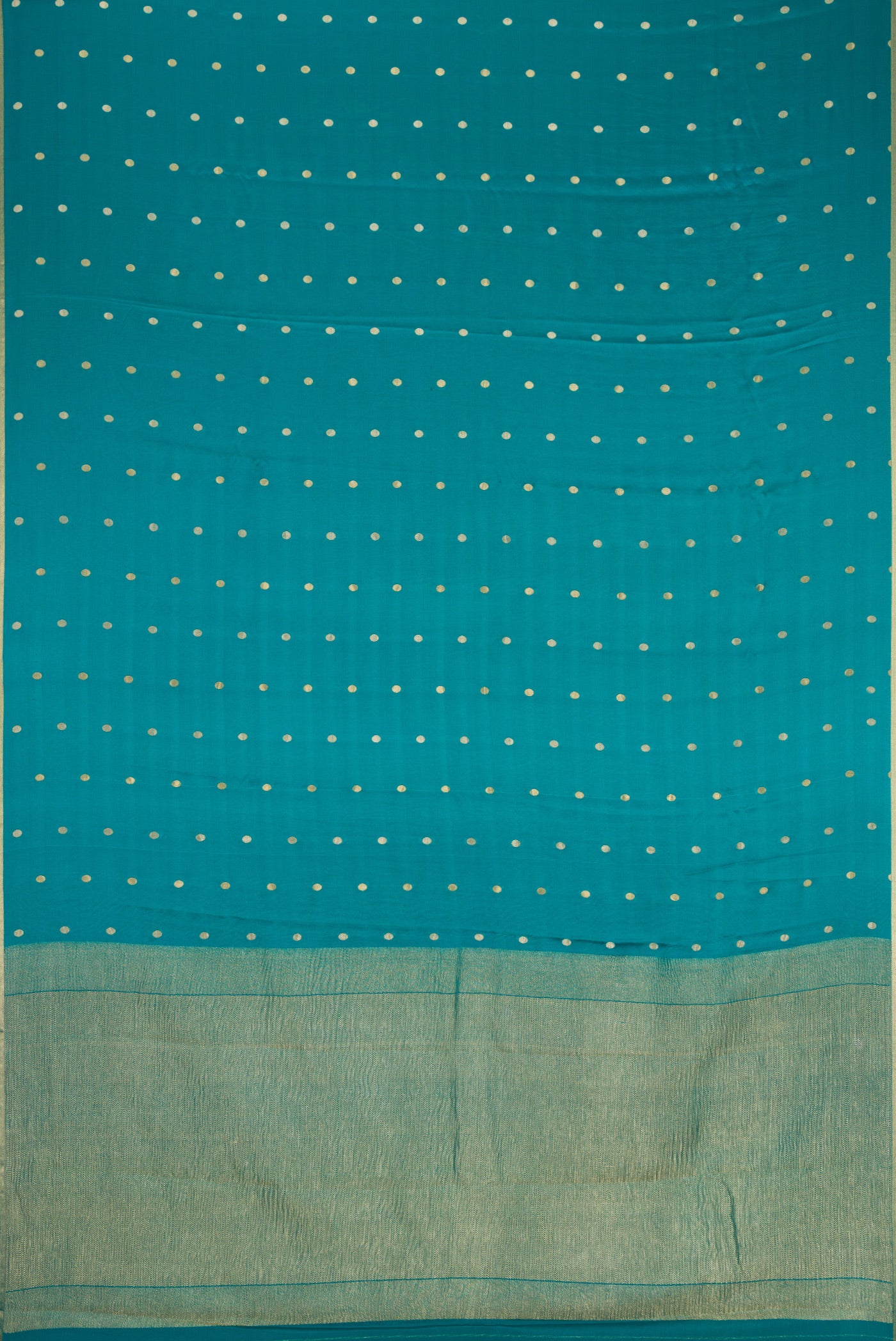 Flat view of Peacock Blue Mysore Chiffon Saree with Zari Butta on the body and Zari Border. 