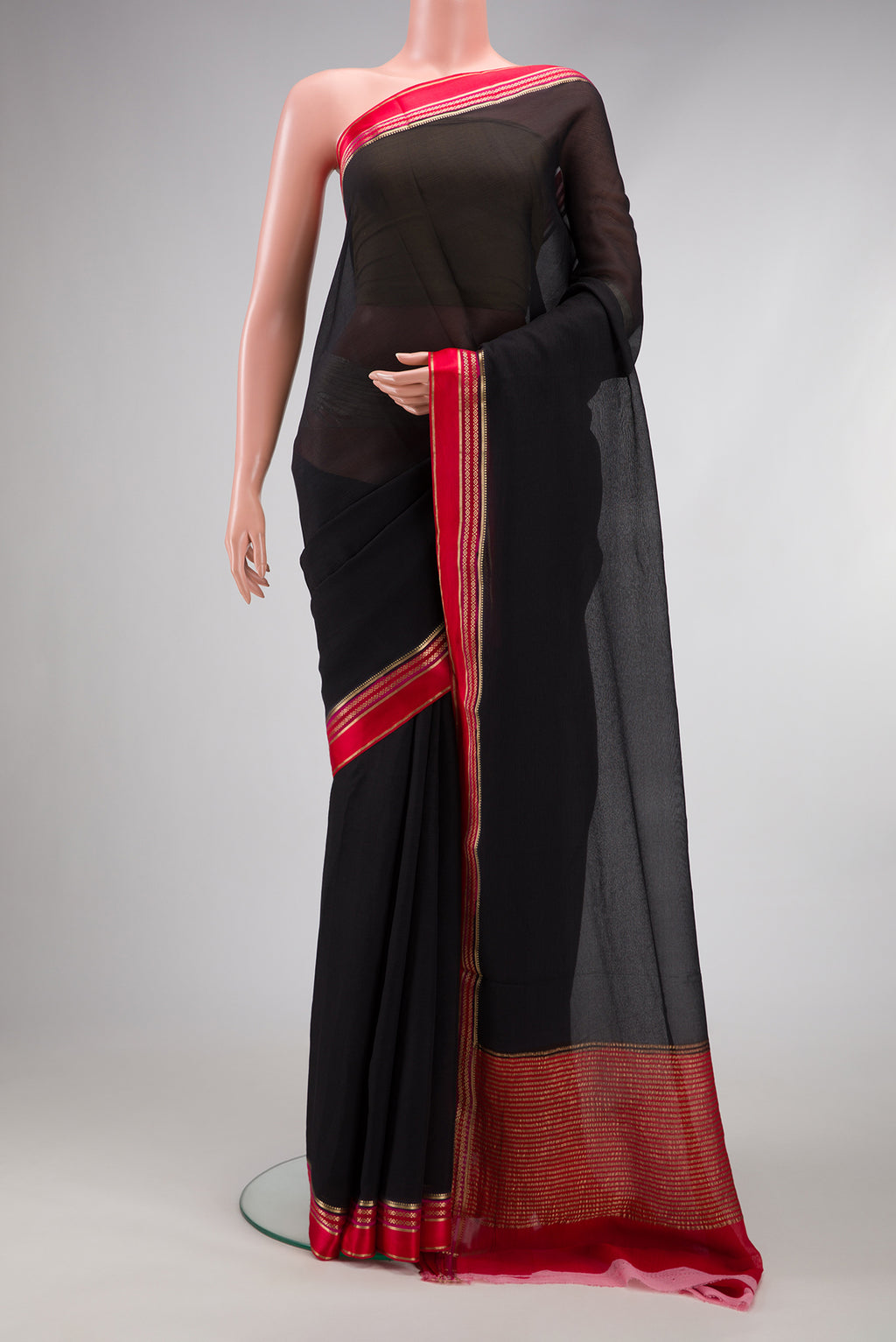 Black Mysore Chiffon Saree with Plain Body and Zari And Thread Border.  displayed on a mannequin