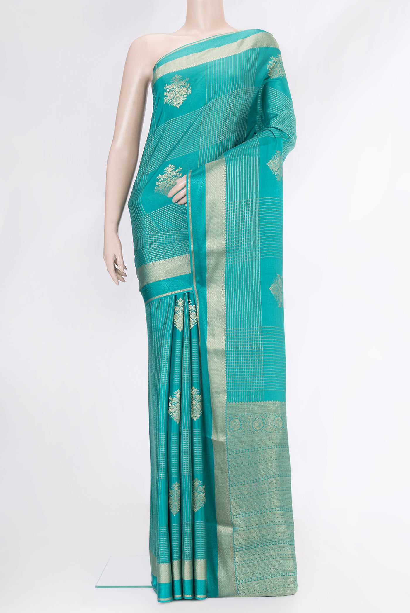 Sky Blue Dual Tone Mysore Crepe Saree with Checked design on the body and Zari And Thread Border.  displayed on a mannequin