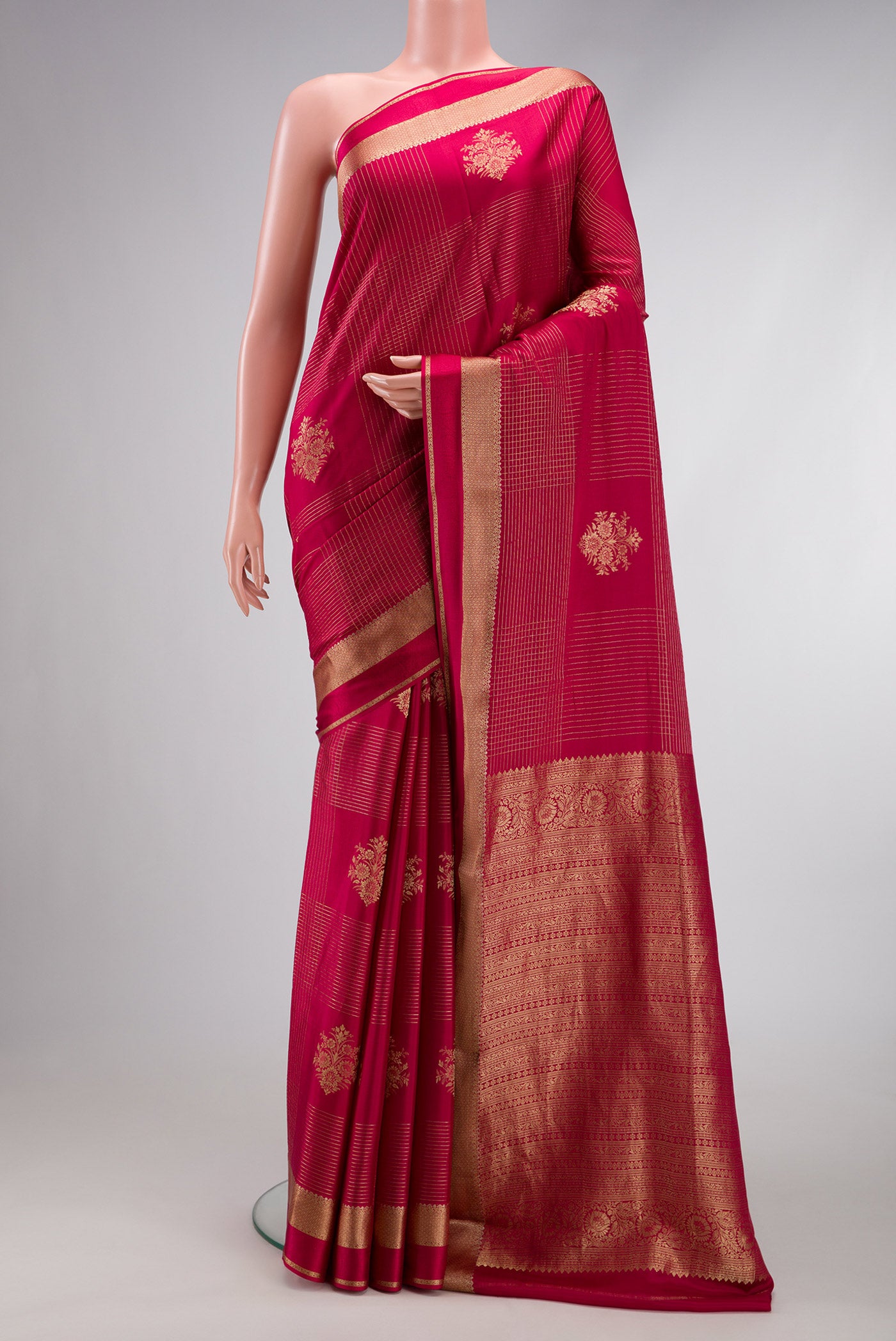 Red Dual Tone Mysore Crepe Saree with Checked design on the body and Zari Border.  displayed on a mannequin