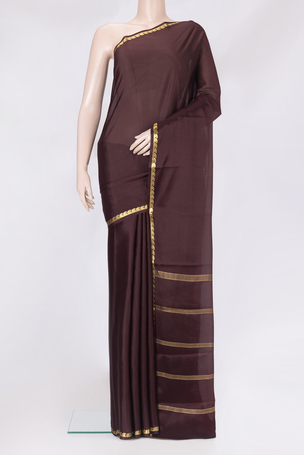 Coffee Brown Mysore Crepe Saree with Plain Body and Zari Border.  displayed on a mannequin