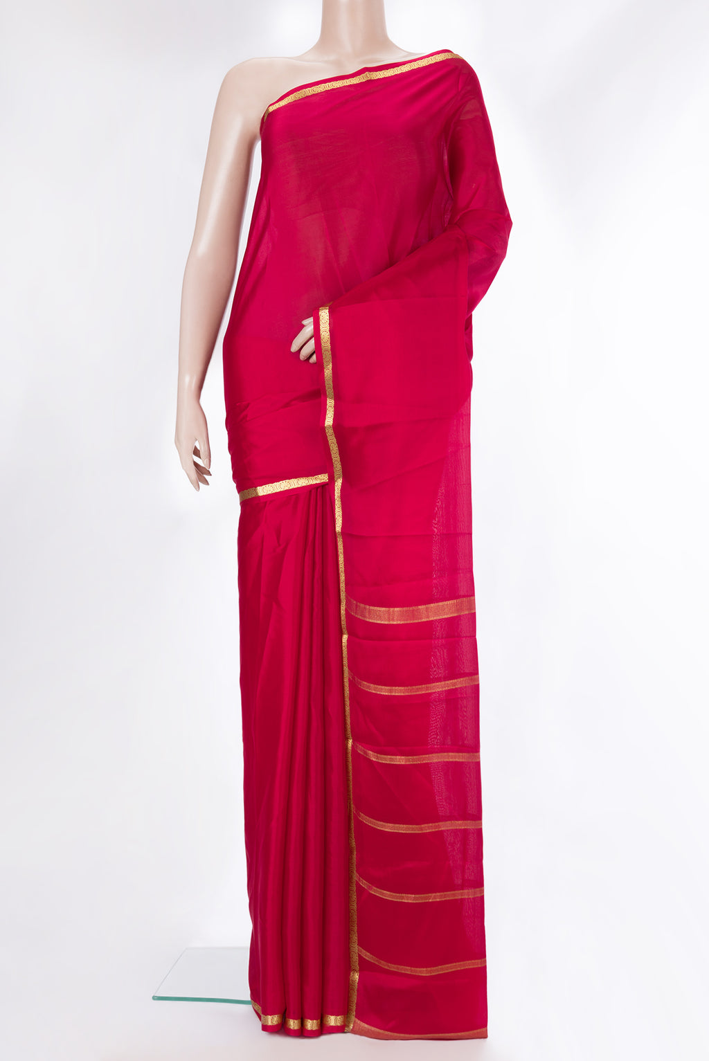 Red Mysore Crepe Saree with Plain Body and Zari Border.  displayed on a mannequin