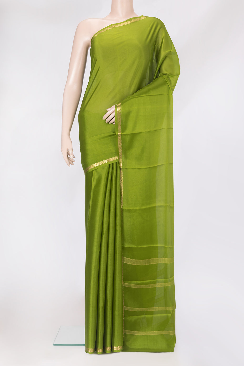 Mehandi Green Mysore Crepe Saree with Plain Body and Zari Border.  displayed on a mannequin