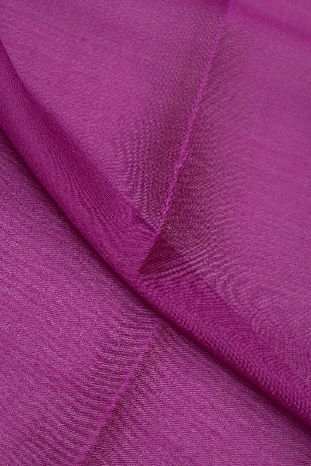 Close up of Purple Mysore Crepe Saree with Plain Body and Zari Border.  displaying folds