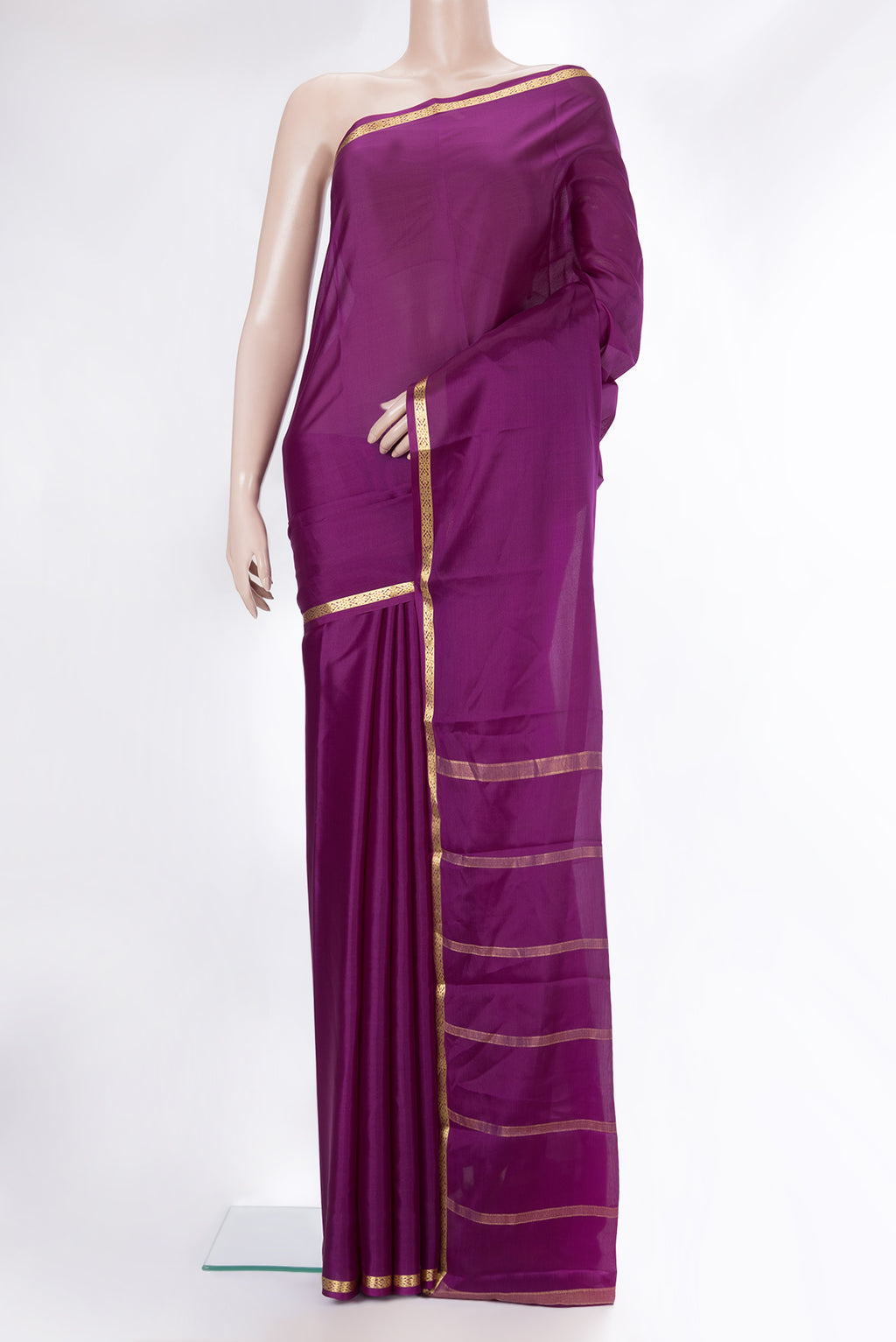 Purple Mysore Crepe Saree with Plain Body and Zari Border.  displayed on a mannequin