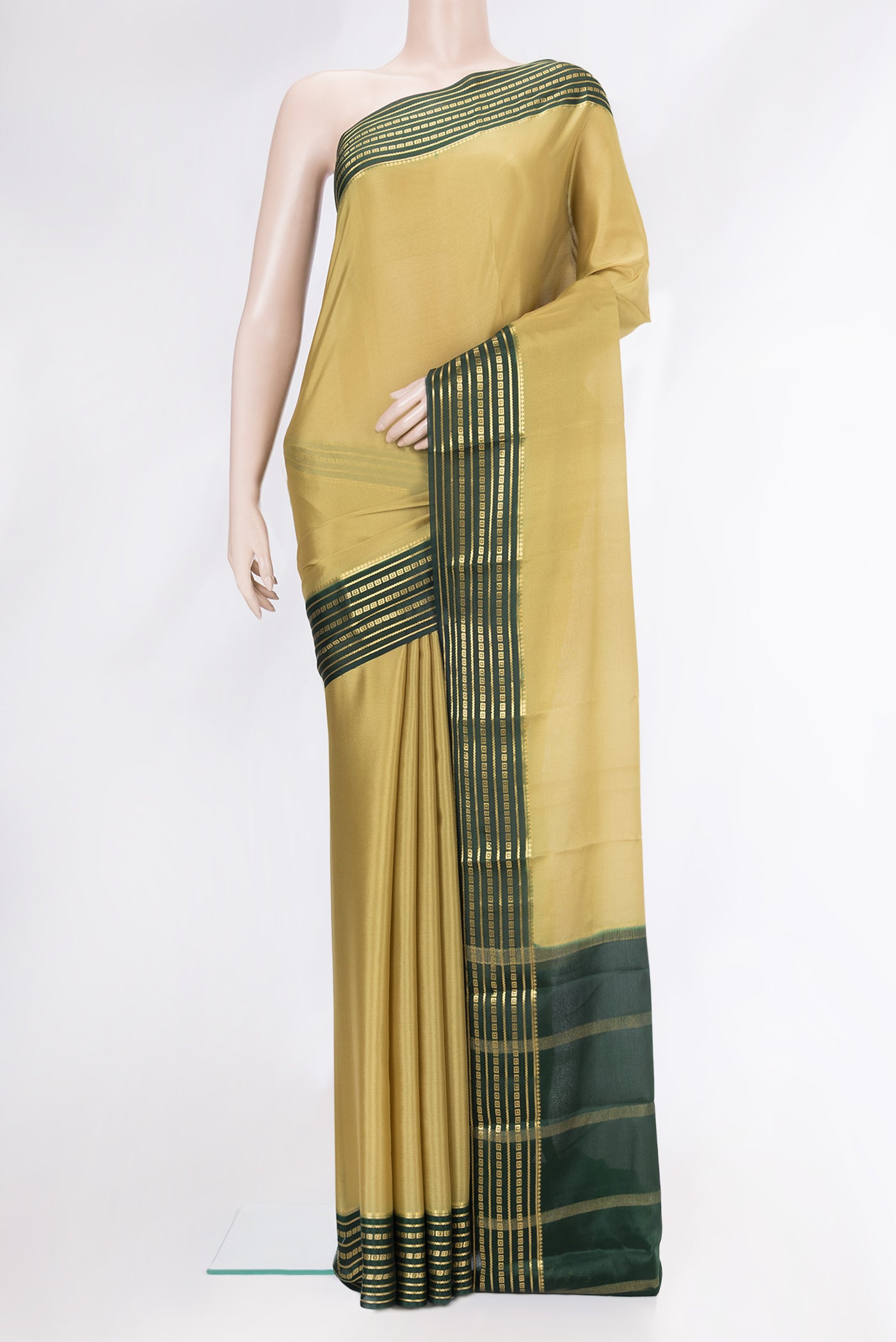 Sandal Dual Tone Mysore Crepe Saree with Plain Body and Zari Border.  displayed on a mannequin