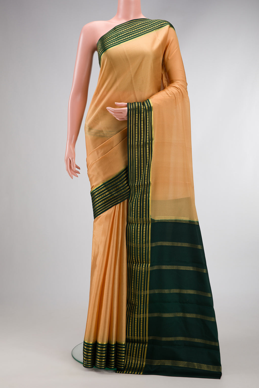Sandal Dual Tone Mysore Silk Saree with Plain Body and Zari Border.  displayed on a mannequin